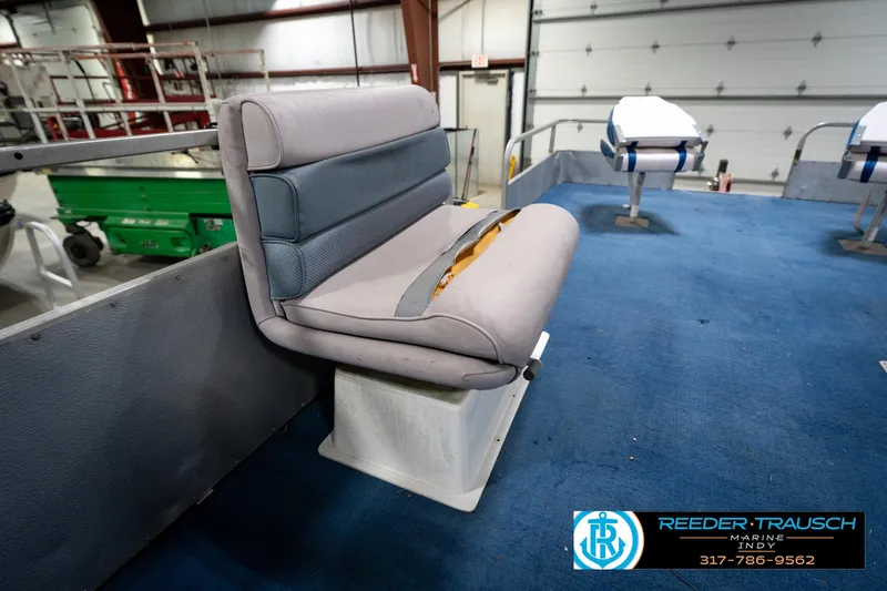 Slide: The Image of Cup holder on a 1988 Landau 20 Adventurer boat, featuring Reeder Trausch Marine branding. - 34