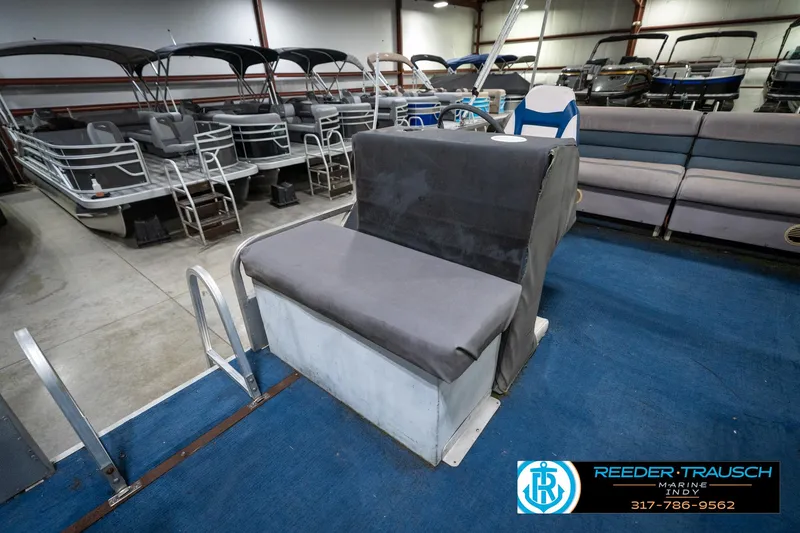 Slide: The Image of Close-up of a Mercury outboard motor on a 1988 Landau 20 Adventurer boat. - 36