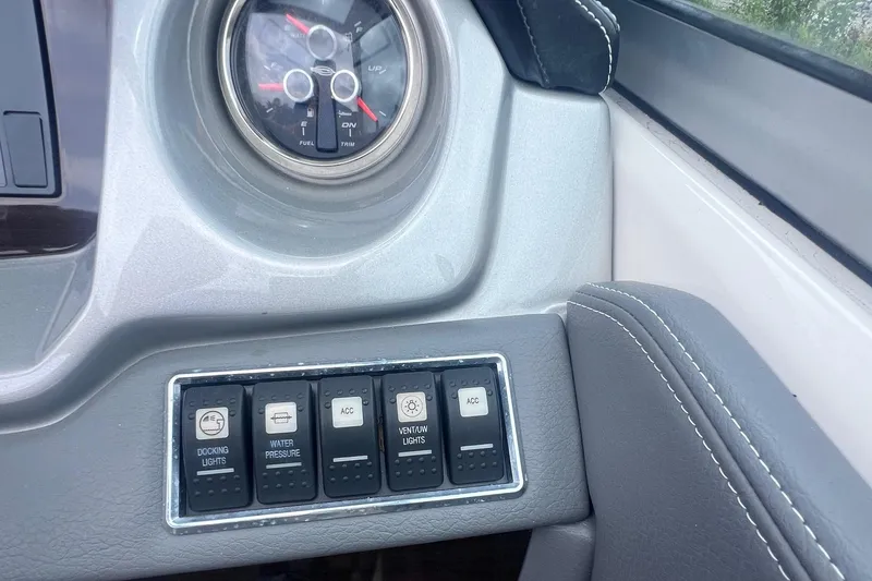 Slide: The Image of Clarion CMS2 stereo system on 2015 Chaparral 224 Sunesta, tuned to 107.9 MHz FM. - 13