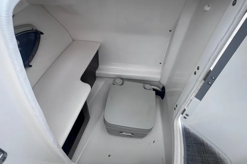 Slide: The Image of White seating area on a 2015 Chaparral 224 Sunesta boat. - 16