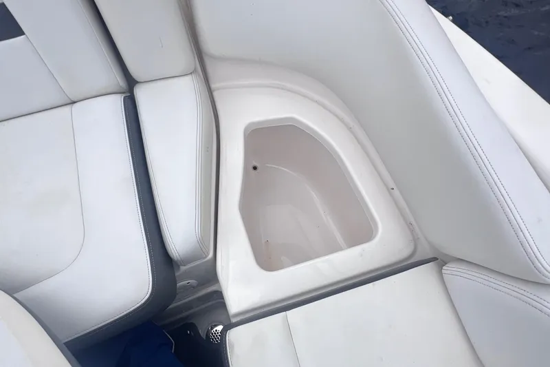 Slide: The Image of 2015 Chaparral 224 Sunesta boat sink with granite countertop and stainless steel handle. - 17