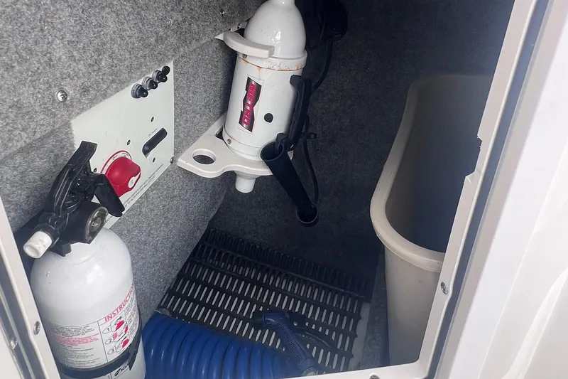 Slide: The Image of Cup holder and textured surface on 2015 Chaparral 224 Sunesta boat. - 19