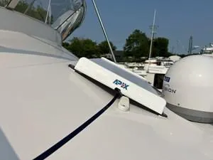 Slide: The Image of 2022 Cutwater C-32 CB boat with APX antenna on deck. - 10