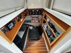 Slide: The Image of 2022 Cutwater C-32 CB interior with control panels and storage shelves. - 8