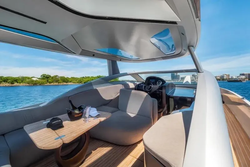 Slide: The Image of Luxurious Tecnomar Evo 55 yacht interior, 2017 model, featuring sleek design and comfortable seating. - 10