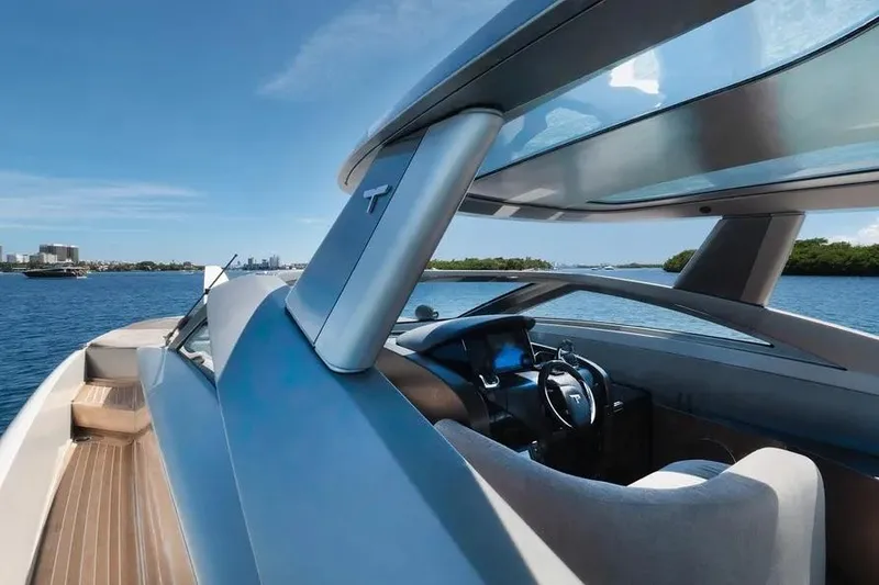Slide: The Image of Luxury Tecnomar Evo 55 yacht interior, 2017 model, with sleek design and scenic ocean view. - 12