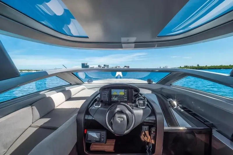 Slide: The Image of Interior view of 2017 Tecnomar Evo 55 yacht cockpit with modern navigation system. - 13
