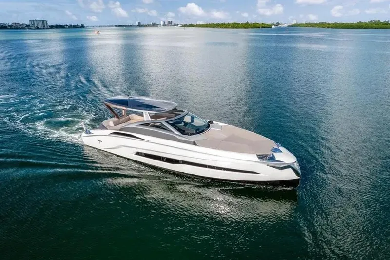 Slide: The Image of Luxury Tecnomar Evo 55 yacht cruising on serene waters, 2017 model. - 21
