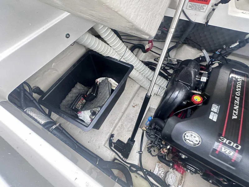 Slide: The Image of Engine compartment of 2015 Rinker 276 Captiva Bowrider with Volvo Penta 300 V8 engine. - 10