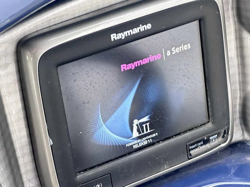 Slide: The Image of Raymarine a Series display on 2015 Rinker 276 Captiva Bowrider boat. - 23