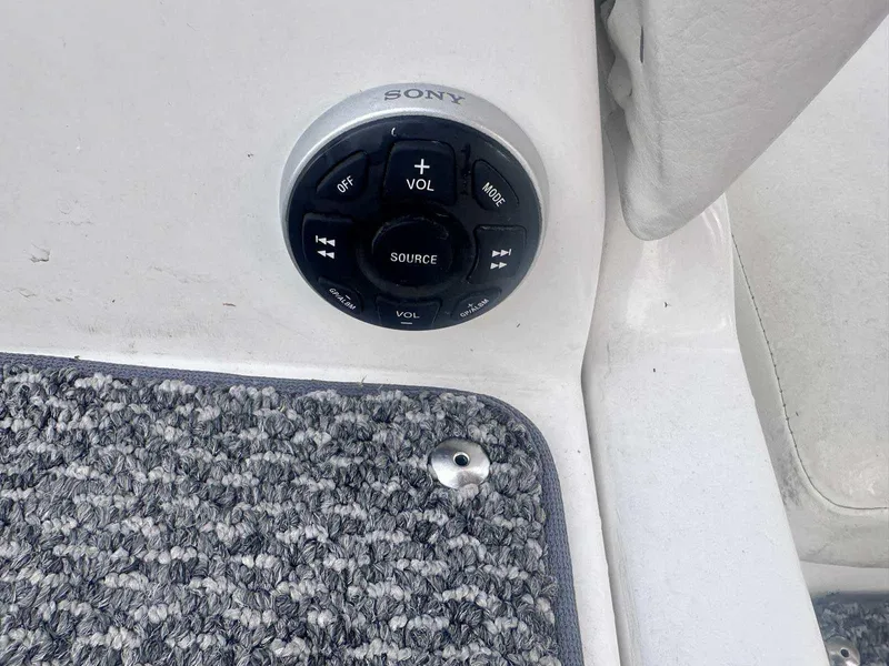Slide: The Image of Sony audio control panel on 2015 Rinker 276 Captiva Bowrider boat. - 8