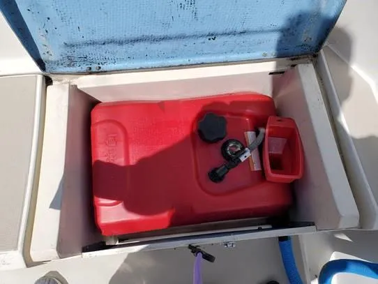 Slide: The Image of Red fuel tank in storage compartment of 1987 O'Day 272 sailboat. - 14
