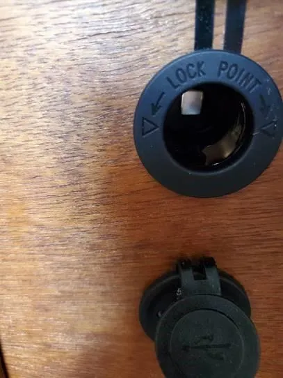 Slide: The Image of Close-up of a 1987 O'Day 272 boat lock mechanism on wooden panel. - 32