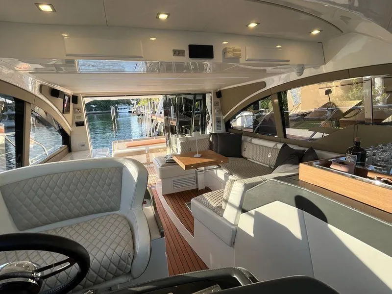 Slide: The Image of Luxurious interior of a 2019 Schaefer 510 yacht with elegant seating and modern design. - 22