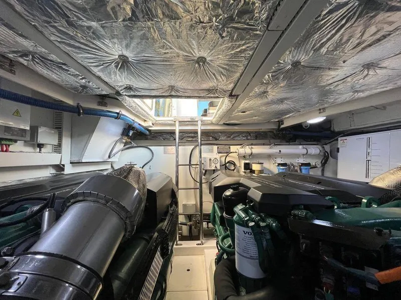 Slide: The Image of Engine room of a 2019 Schaefer 510 yacht, featuring advanced machinery and insulation. - 25