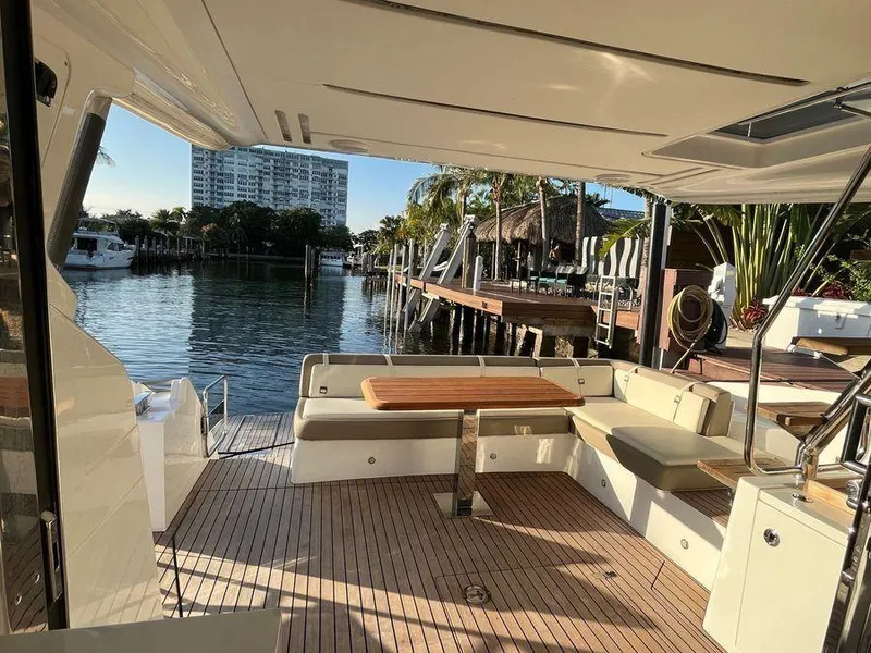 Slide: The Image of Luxurious 2019 Schaefer 510 yacht with elegant deck, docked by waterfront. - 29