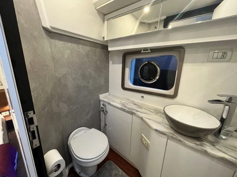 Slide: The Image of Luxurious bathroom in 2019 Schaefer 510 yacht with modern fixtures and marble countertop. - 46