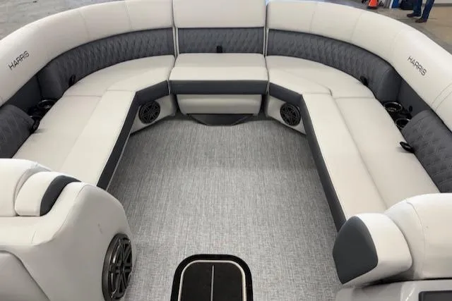 Slide: The Image of Luxurious interior of 2025 Harris Sunliner 230 pontoon boat with plush seating. - 10