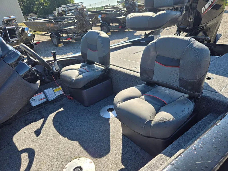 Slide: The Image of 2023 Tracker Pro Team 175 TF boat interior with two cushioned seats. - 14