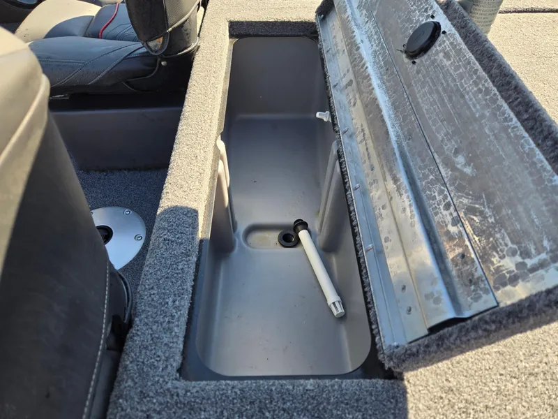 Slide: The Image of Open storage compartment in 2023 Tracker Pro Team 175 TF boat. - 16