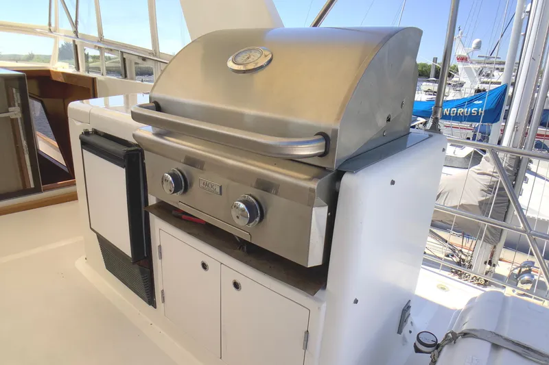 Slide: The Image of Outdoor grill on 1998 Grand Alaskan 60 Pilothouse yacht deck. - 45