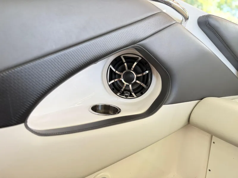 Slide: The Image of 2024 Checkmate Pulsare 2400 BRX interior speaker detail with sleek design. - 24