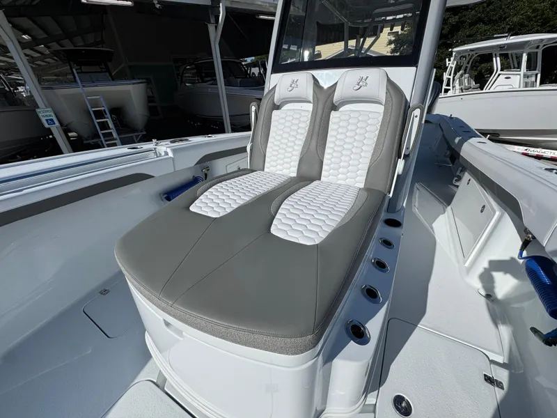 Slide: The Image of 2026 Yellowfin 36 Offshore boat with dual cushioned seats and modern design. - 27
