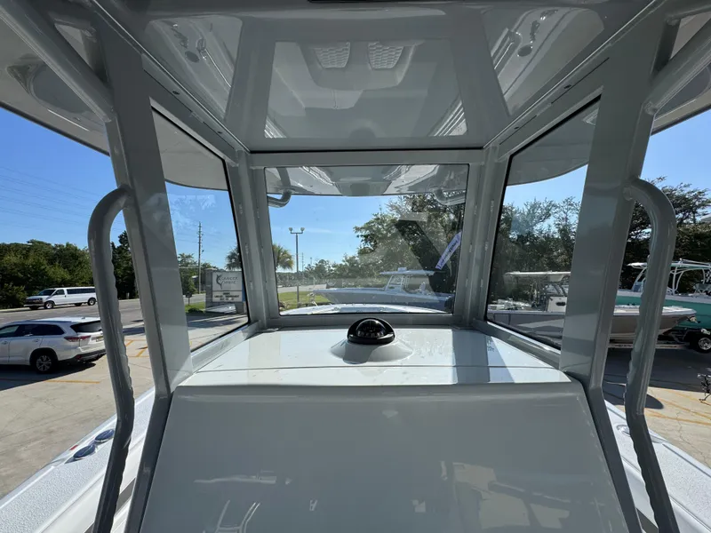 Slide: The Image of Interior view of 2026 Yellowfin 36 Offshore boat cockpit with clear windows. - 37