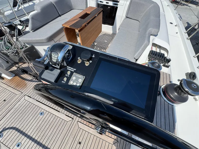 Slide: The Image of Cockpit of 2024 Beneteau First 44 sailboat with modern navigation equipment. - 8