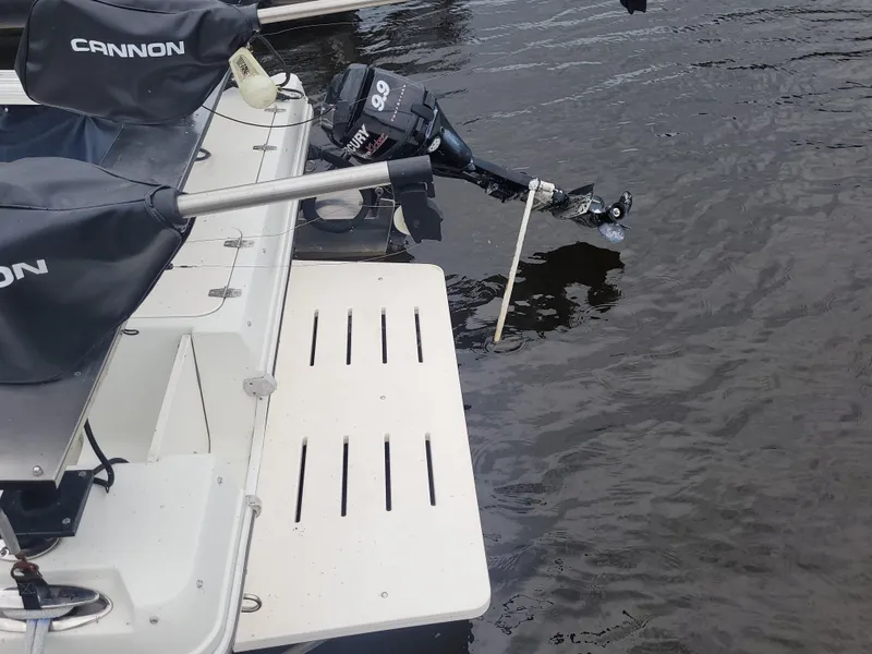 Slide: The Image of 2003 Caravelle Sea Hawk 230 Walk Around OB with Mercury outboard motor on water. - 6