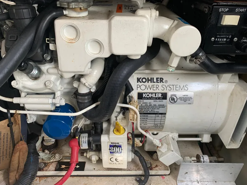 Slide: The Image of Engine compartment of a 2006 Sea Ray 280 Sundancer with Kohler power system. - 24