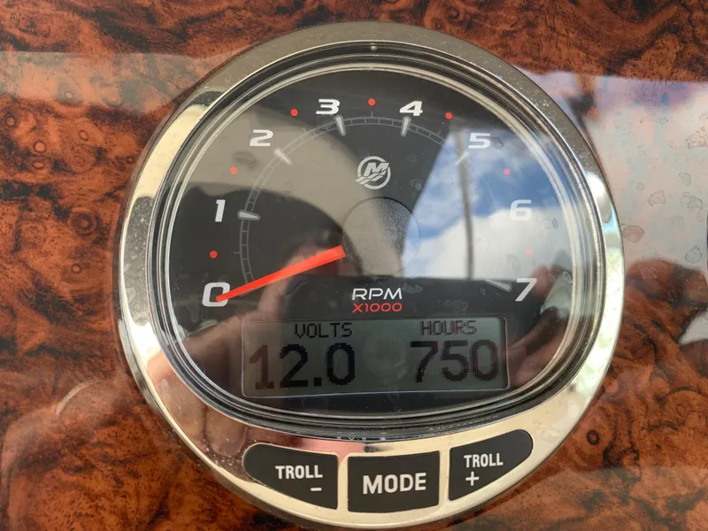 Slide: The Image of Tachometer of 2006 Sea Ray 280 Sundancer showing 750 hours and 12 volts. - 5