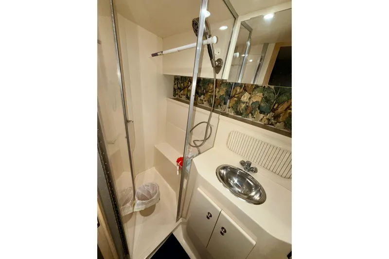 Slide: The Image of Bathroom interior of 1997 Carver 405 Motor Yacht with shower and sink. - 40