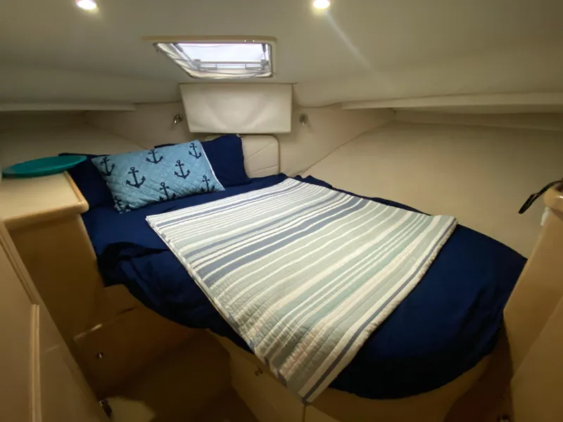 Slide: The Image of Interior of 1997 Carver 405 Motor Yacht kitchen with appliances and cabinetry. - 26