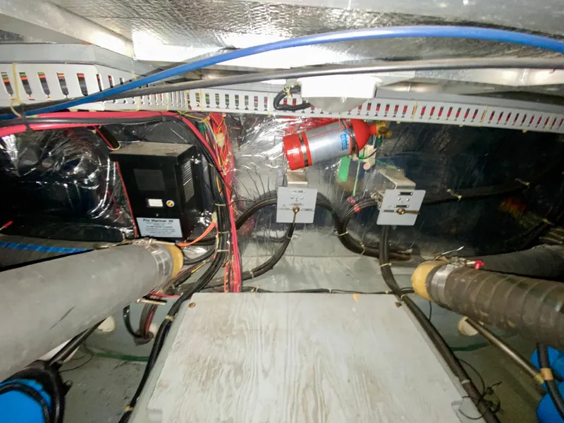 Slide: The Image of Engine room of 1997 Carver 405 Motor Yacht with wiring and equipment. - 45