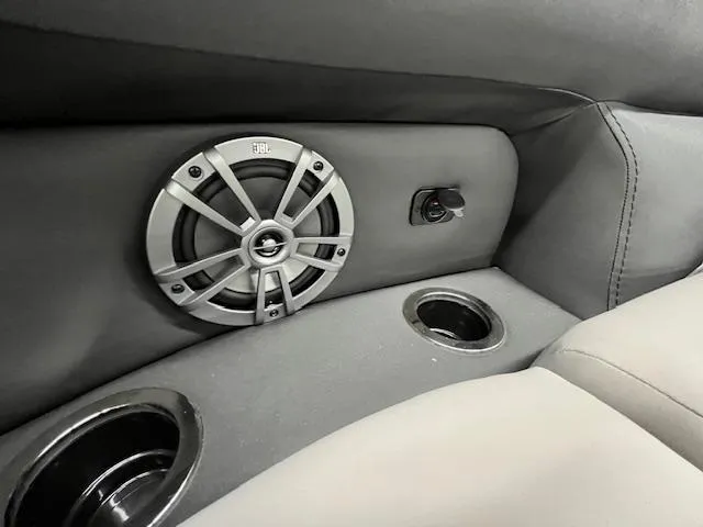 Slide: The Image of Interior of 2025 Barletta ARIA 20QC featuring JBL speaker and cup holders. - 14
