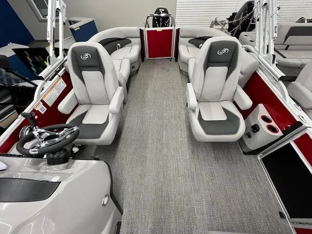 Slide: The Image of 2025 Barletta ARIA 20QC pontoon boat interior with gray and red seating. - 23