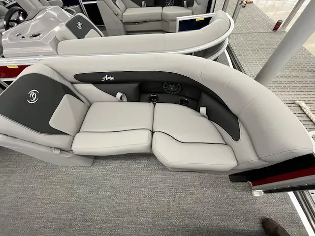Slide: The Image of 2025 Barletta ARIA 20QC pontoon boat interior with gray seating and cup holders. - 25