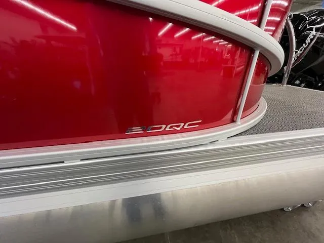 Slide: The Image of 2025 Barletta ARIA 20QC pontoon boat with red exterior detailing. - 3