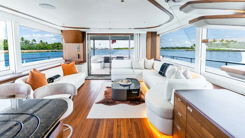 Slide: The Image of Luxurious 2024 Princess X80 yacht interior with elegant seating and panoramic ocean views. - 16