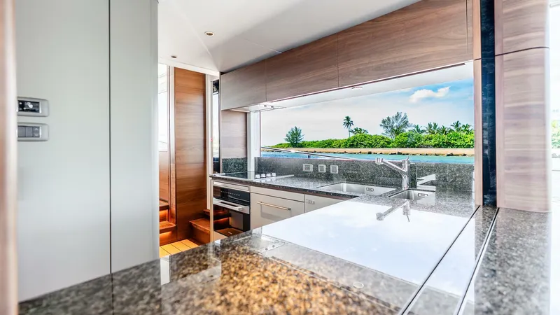 Slide: The Image of Luxurious kitchen interior of 2024 Princess X80 yacht with ocean view. - 20