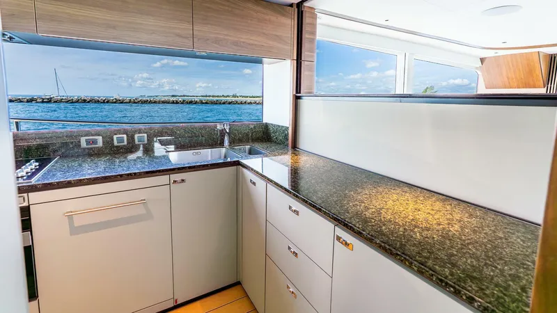 Slide: The Image of Luxurious kitchen interior of 2024 Princess X80 yacht with ocean view. - 21