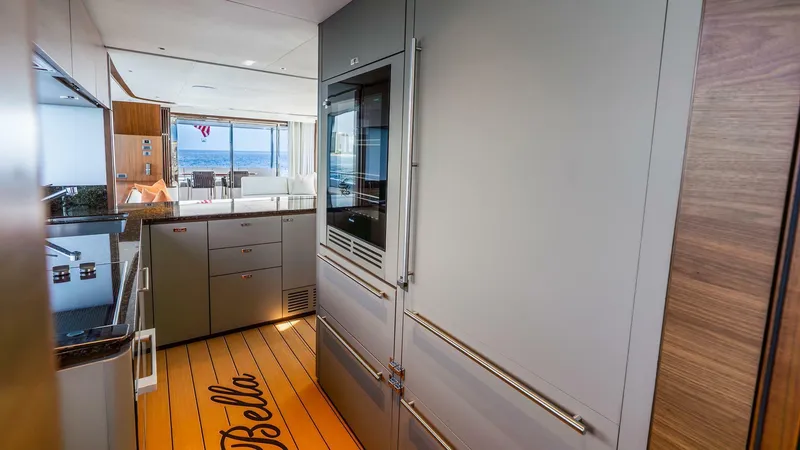 Slide: The Image of Luxurious kitchen interior of 2024 Princess X80 yacht with ocean view. - 25
