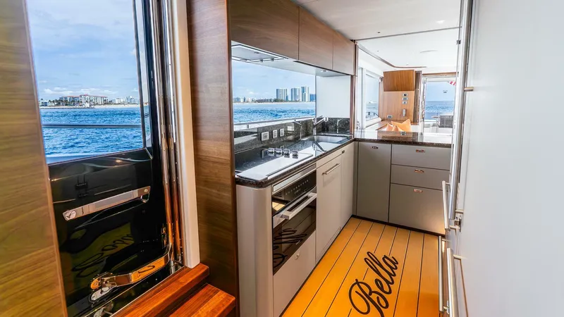 Slide: The Image of Luxurious 2024 Princess X80 yacht interior with modern kitchen and ocean view. - 26