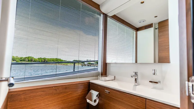 Slide: The Image of Luxurious bathroom interior on 2024 Princess X80 yacht with modern fixtures and scenic window view. - 27