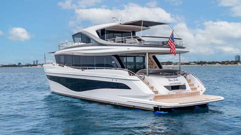Slide: The Image of Luxurious 2024 Princess X80 yacht cruising on open water under a clear blue sky. - 3