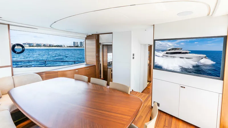 Slide: The Image of Luxurious interior of 2024 Princess X80 yacht with ocean view and elegant dining area. - 30