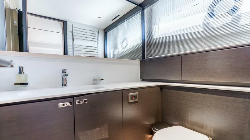 Slide: The Image of Luxurious bathroom interior of 2024 Princess X80 yacht, featuring modern fixtures and sleek design. - 43