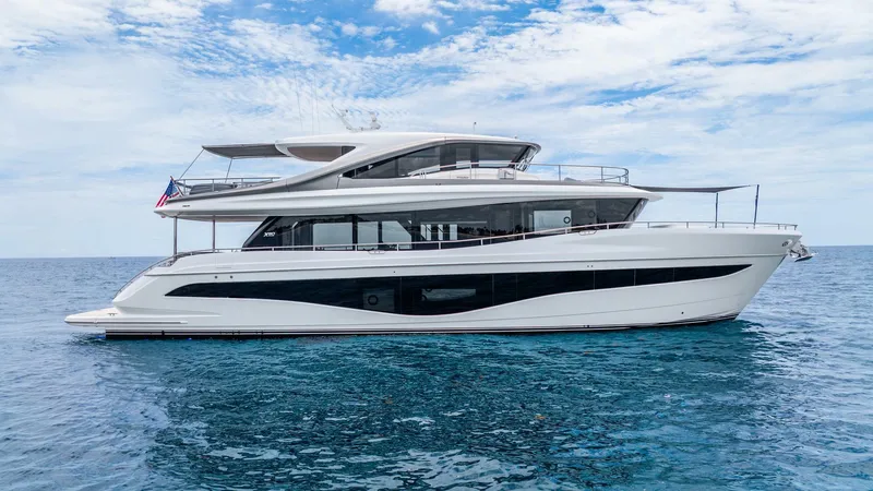 Slide: The Image of 2024 Princess X80 yacht on open sea under blue sky. - 5