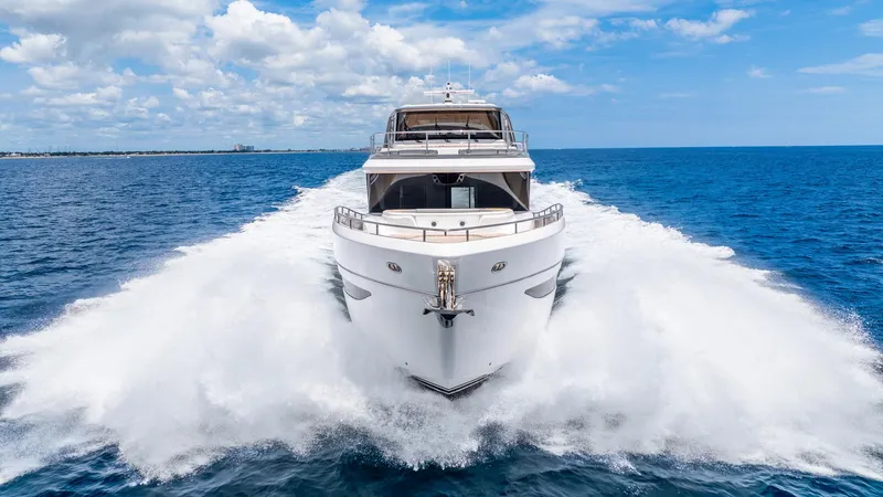 Slide: The Image of 2024 Princess X80 yacht cruising on open sea under blue sky. - 7